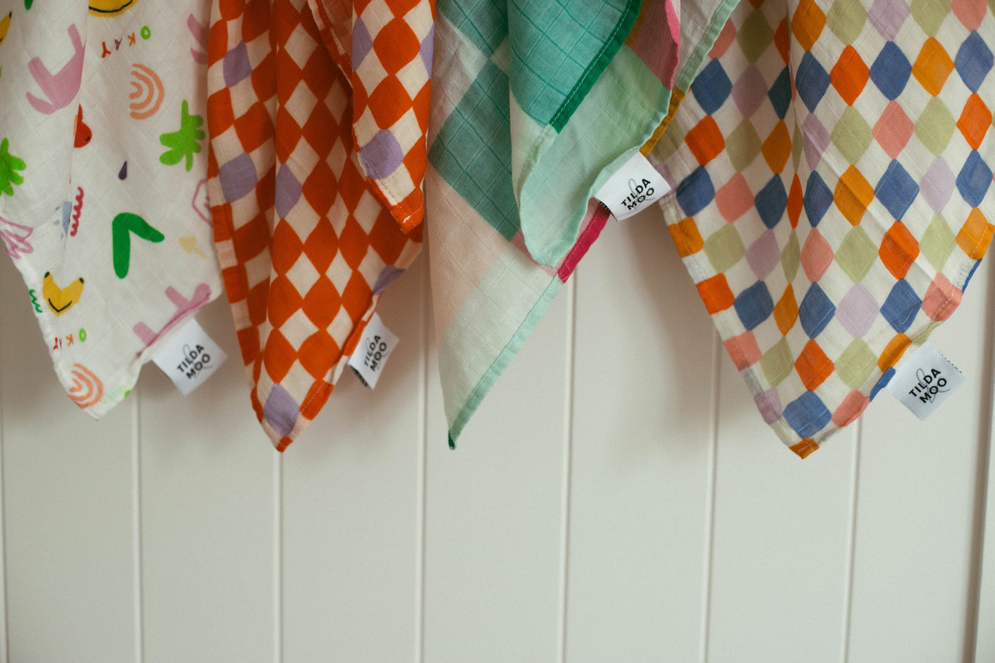 Check Mate Cherry Red with Lilac Speck | Swaddle