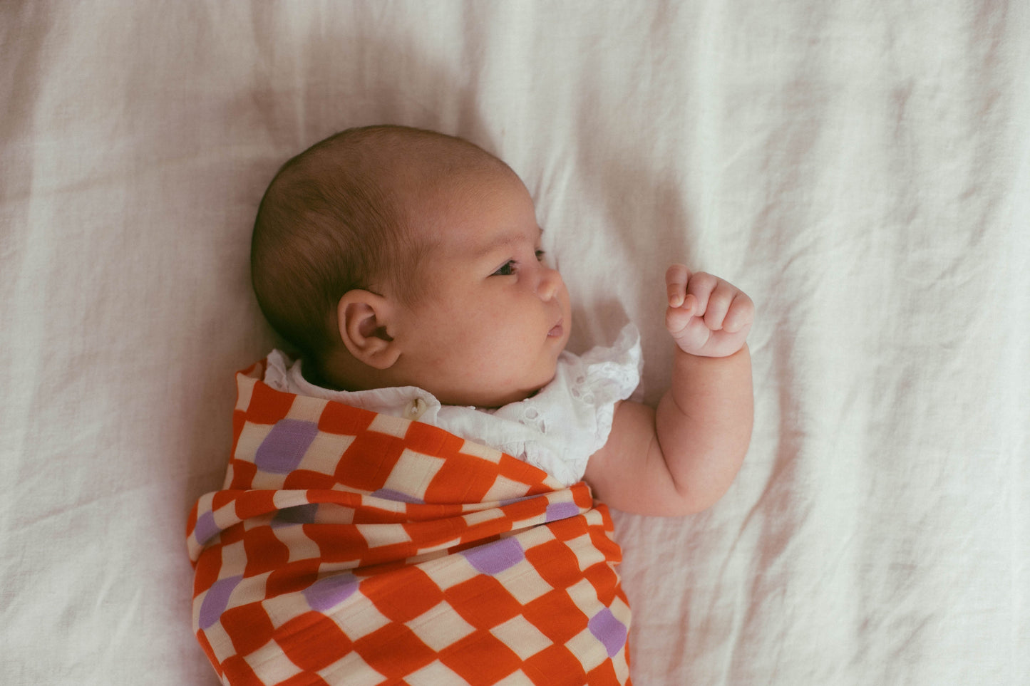 Check Mate Cherry Red with Lilac Speck | Swaddle