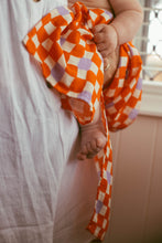 Load image into Gallery viewer, Check Mate Cherry Red with Lilac Speck | Swaddle