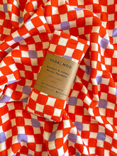 Load image into Gallery viewer, Check Mate Cherry Red with Lilac Speck | Swaddle